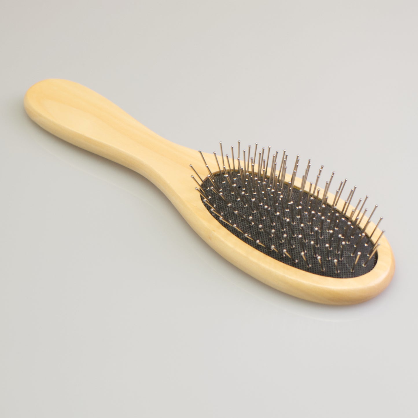 Steel pin body control brush