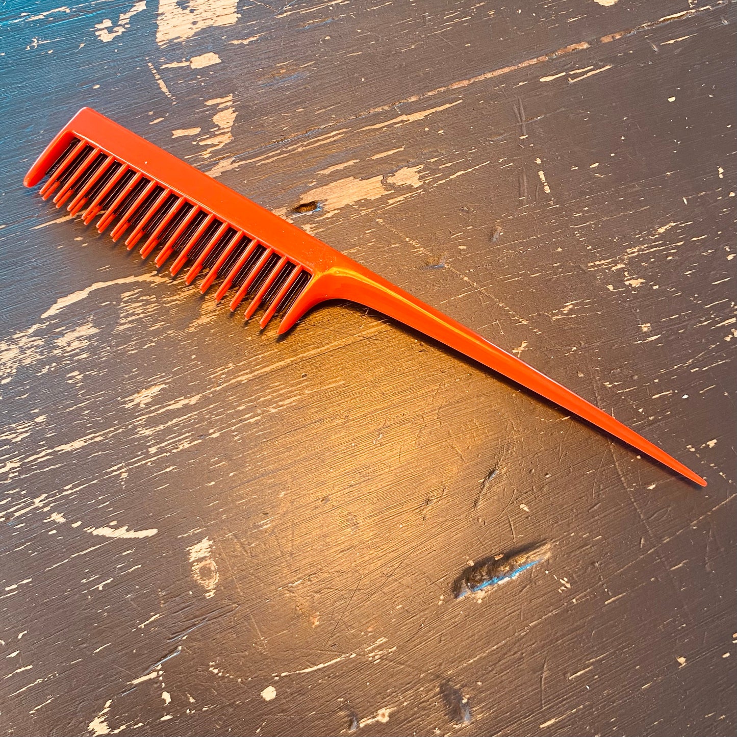 Backcomber packing comb
