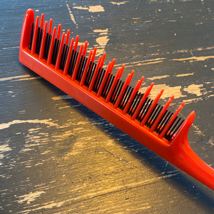 Backcomber packing comb