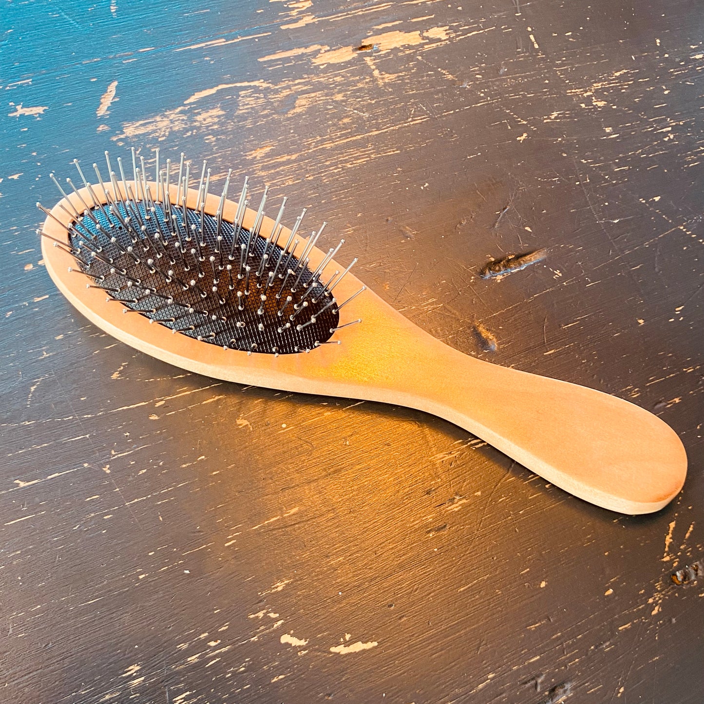 Steel pin body control brush